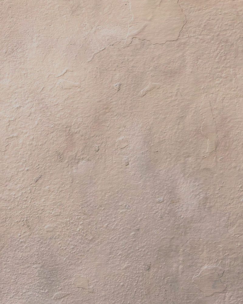Close-up of an aged, rough wall surface